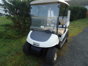 Golfette Ezgo avec batterie de 48 Volts et kit covering + benne avec ouverture arrière